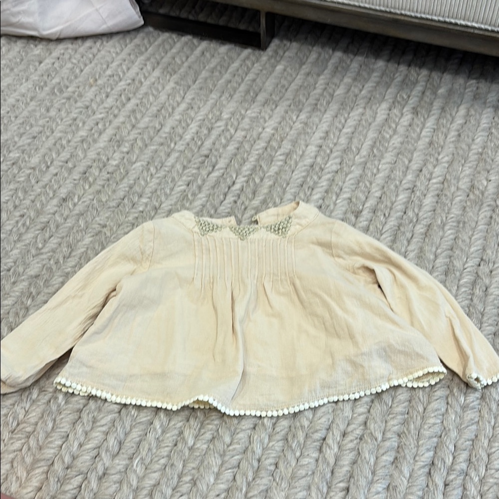 Cream Blouse with Pleated Bodice and Long Sleeves